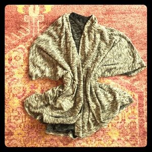 Cozy loose-hanging black/white knit wrap sweater